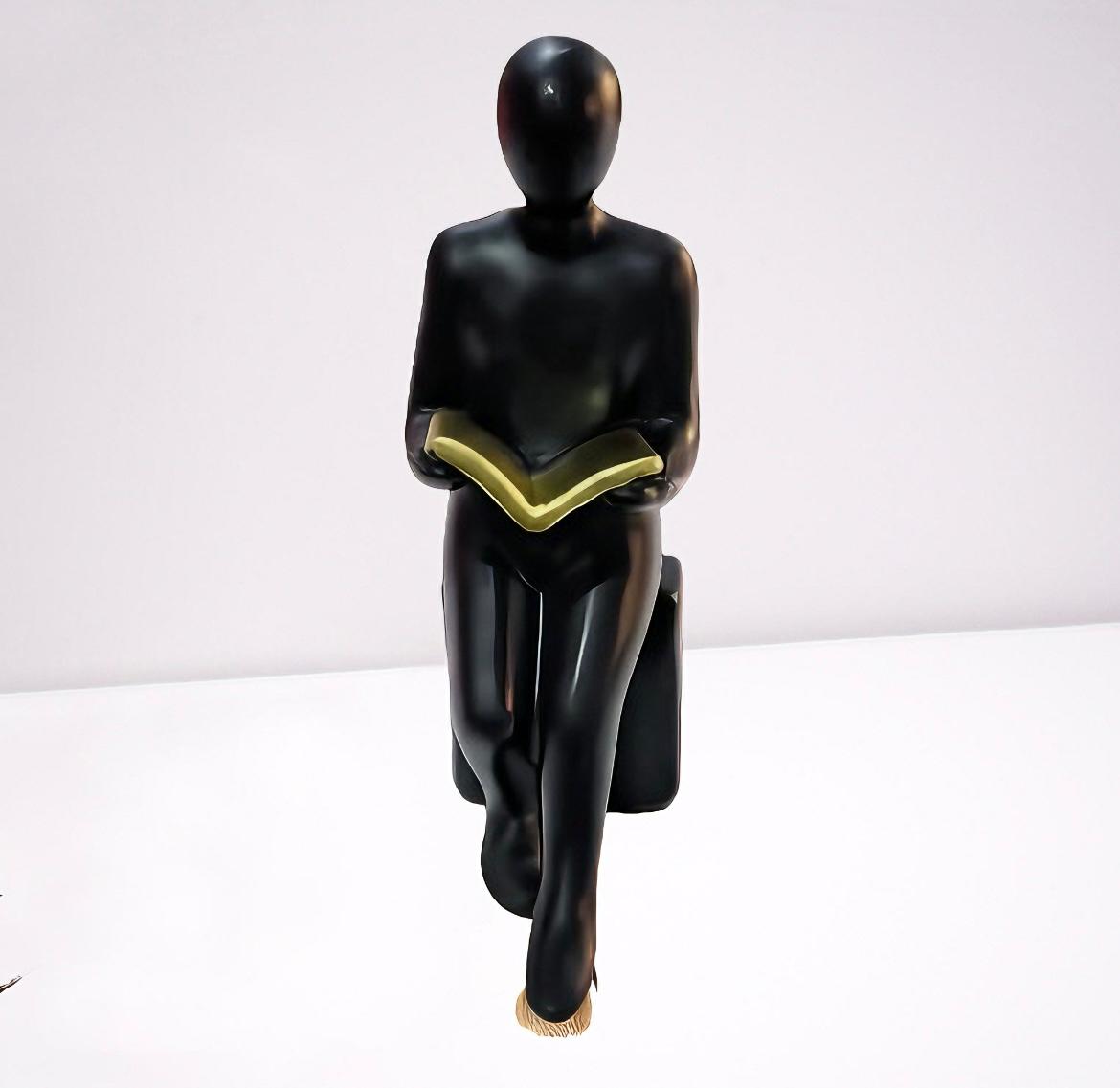 Abstract Man Reading Figurine