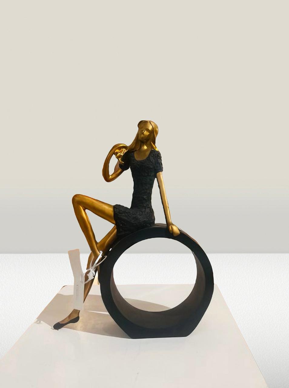 Elegant Gold and Black Seated Figurine_Modern Decor