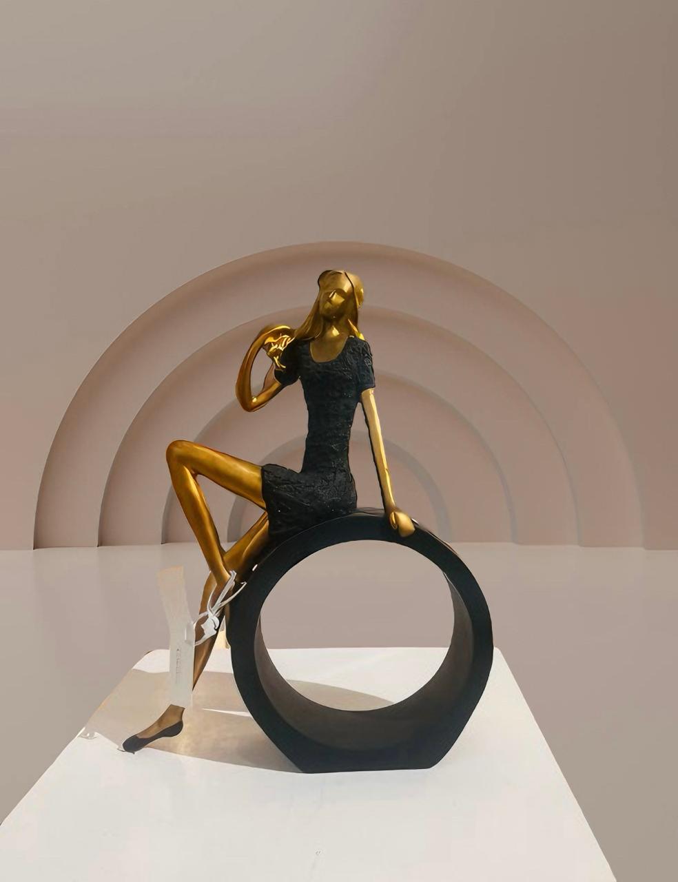 Elegant Gold and Black Seated Figurine_Modern Decor