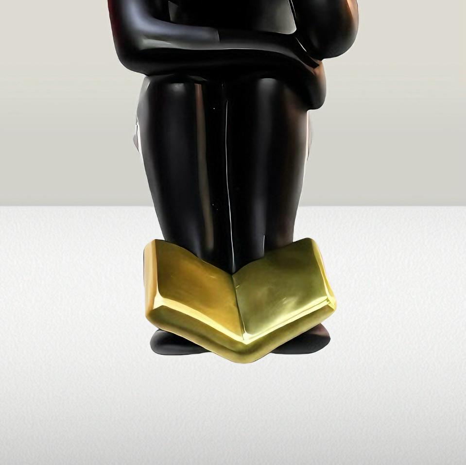 Abstract Reader statue with Golden Book
