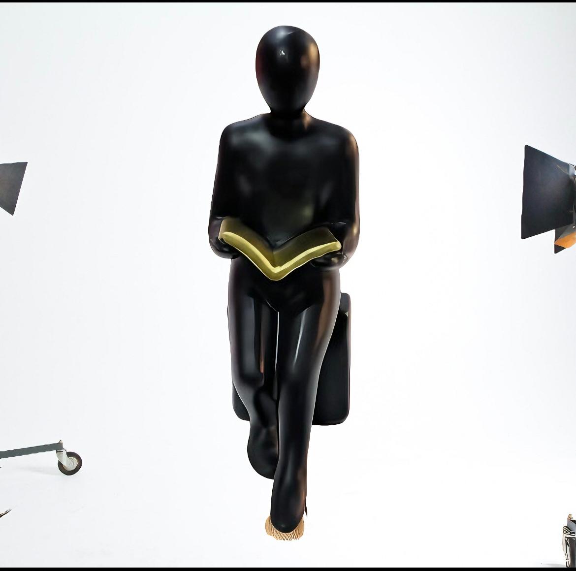 Abstract Man Reading Figurine